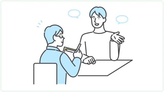 打ち合わせ中の二人の人物のイラスト（会話している様子）